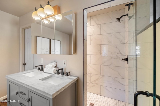 bathroom featuring walk in shower and vanity