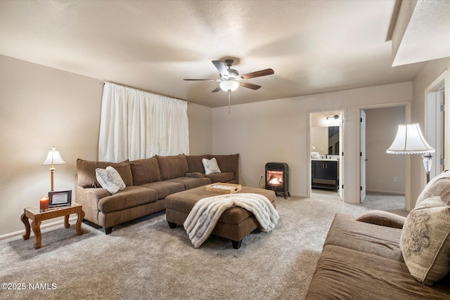 living room featuring light carpet and ceiling fan