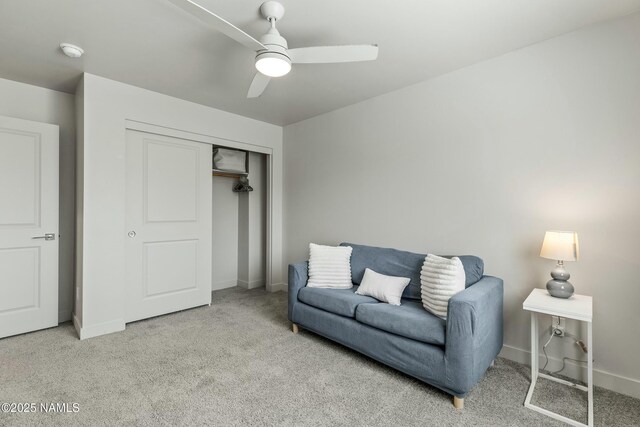 12220 Curtis Ct, Bellemont, AZ 86015 - living area with carpet floors, ceiling fan, and baseboards
