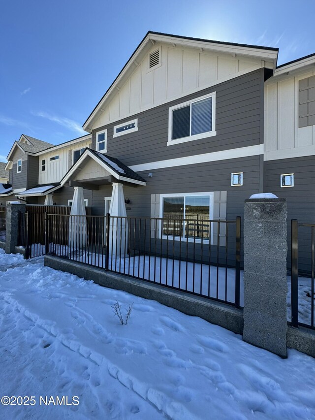 view of side of home featuring a garage