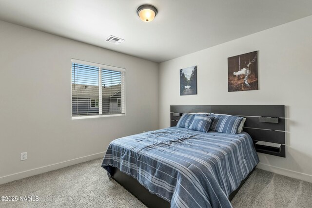12220 Curtis Ct, Bellemont, AZ 86015 - bedroom with baseboards, visible vents, and carpet floors