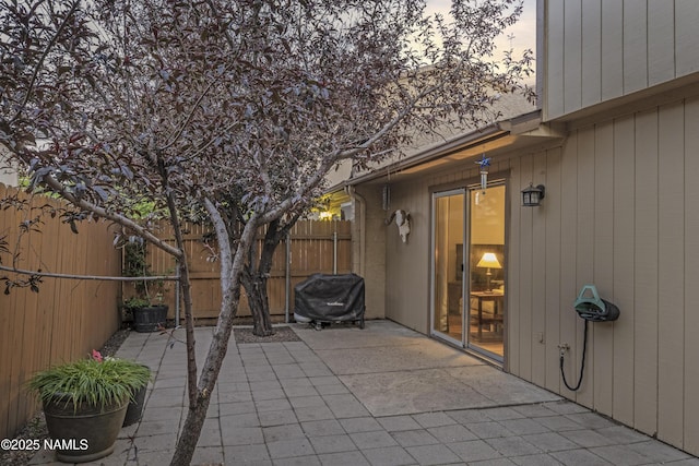 2550 E Cassidy Ln, Flagstaff, AZ 86004 - fenced backyard featuring a patio and area for grilling