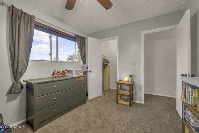 2550 E Cassidy Ln, Flagstaff, AZ 86004 - bedroom featuring a textured ceiling, carpet floors, and ceiling fan