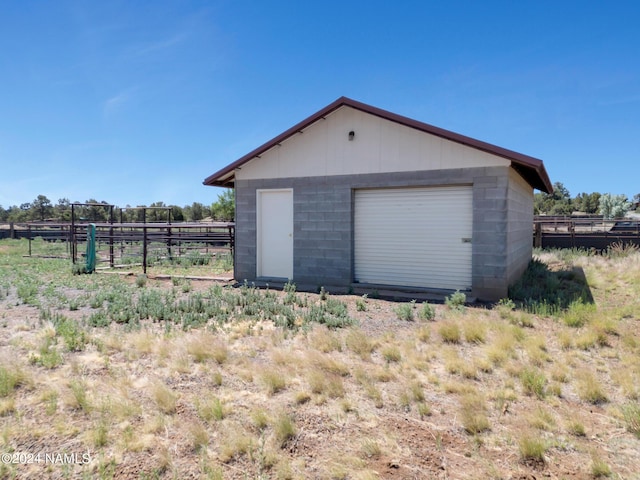 garage with a rural view