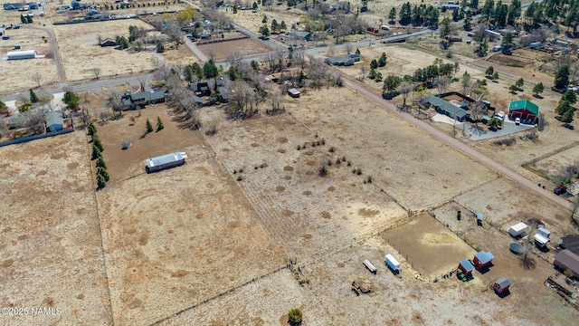 bird's eye view featuring a rural view and a desert view
