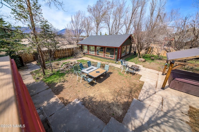 exterior space with a fenced backyard