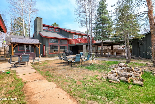 rear view of property with a patio area