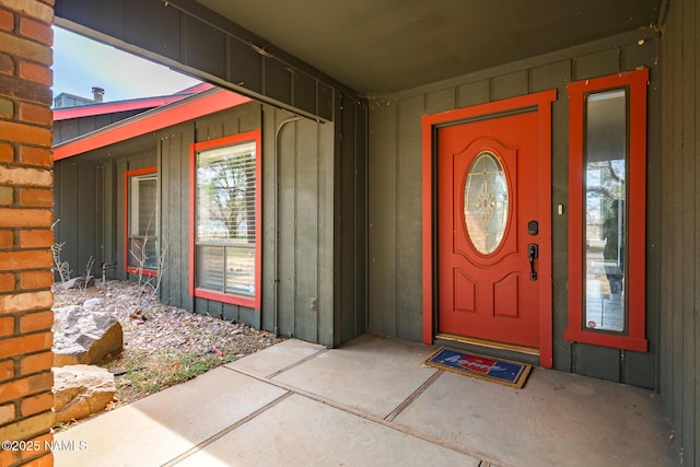 property entrance with board and batten siding