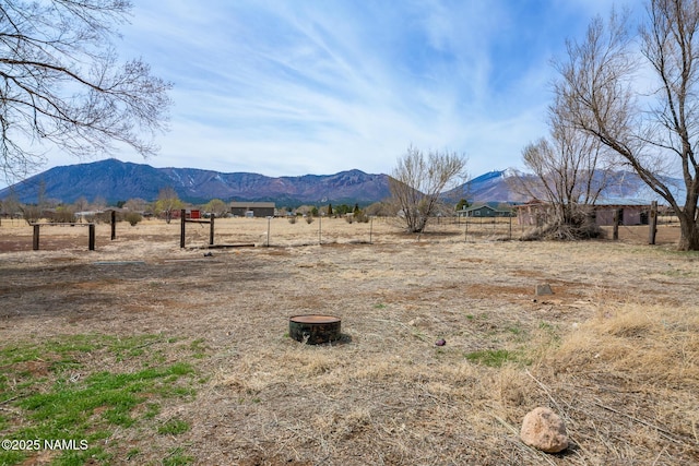 mountain view featuring a rural view