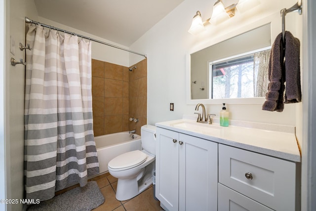 full bathroom featuring tile patterned floors, toilet, shower / tub combo with curtain, and vanity