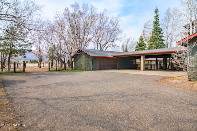 view of property exterior with driveway
