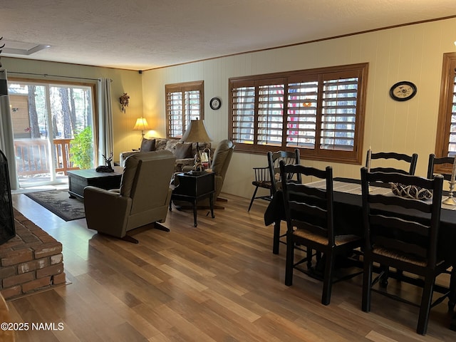 2511 Black Bear Ln, Pine Top, AZ 85935 - dining room with ornamental molding, a textured ceiling, and wood finished floors
