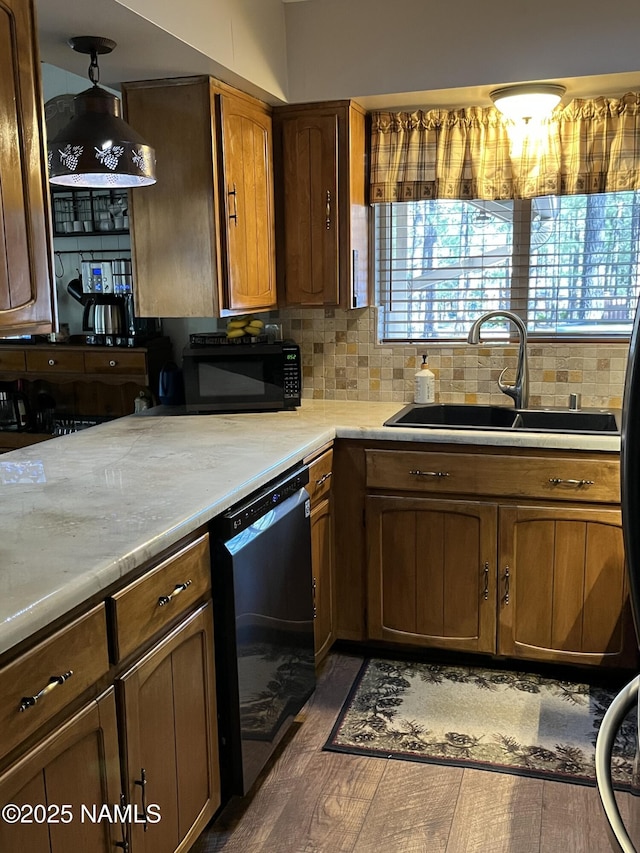 2511 Black Bear Ln, Pine Top, AZ 85935 - kitchen featuring a sink, black microwave, dishwasher, wood finished floors, and light countertops