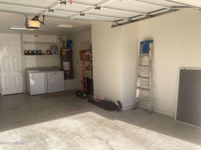 garage featuring washing machine and dryer, a garage door opener, and strapped water heater