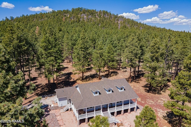 1533 S Minstrel Ln, Williams, AZ 86046 - aerial view of property and surrounding area featuring a heavily wooded area