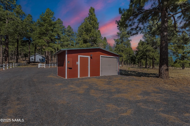 1533 S Minstrel Ln, Williams, AZ 86046 - outdoor structure at dusk with view of scattered trees