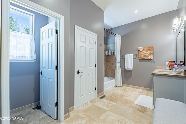 1533 S Minstrel Ln, Williams, AZ 86046 - bathroom featuring vanity and shower / bathtub combination with curtain