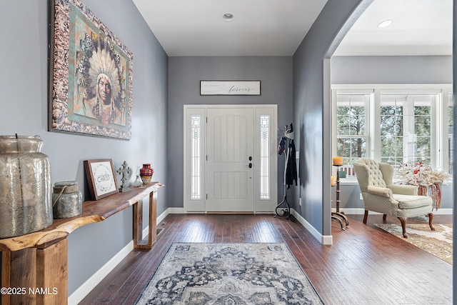 1533 S Minstrel Ln, Williams, AZ 86046 - foyer featuring dark wood finished floors and arched walkways