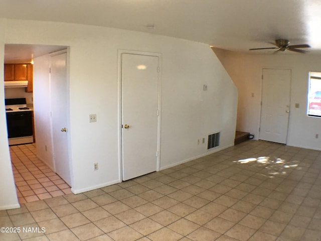2157 E Arroyo Seco Dr, Flagstaff, AZ 86004 - unfurnished living room with ceiling fan and light tile patterned flooring