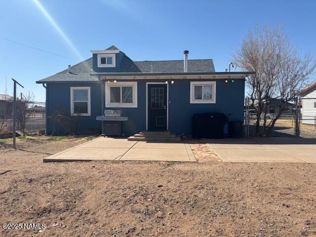 back of house featuring fence and a patio