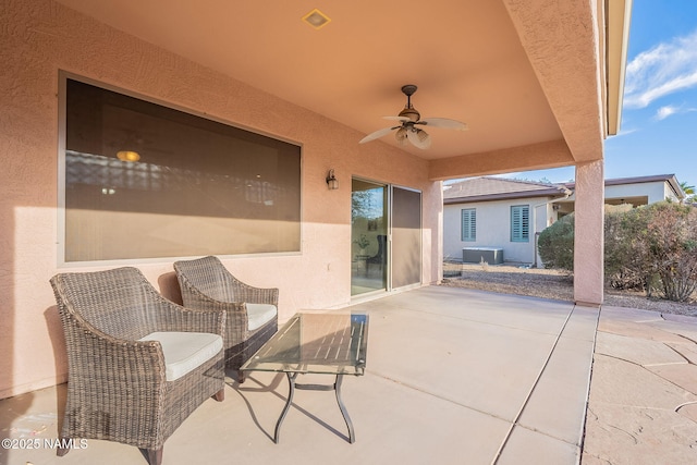 view of patio / terrace with central AC and ceiling fan