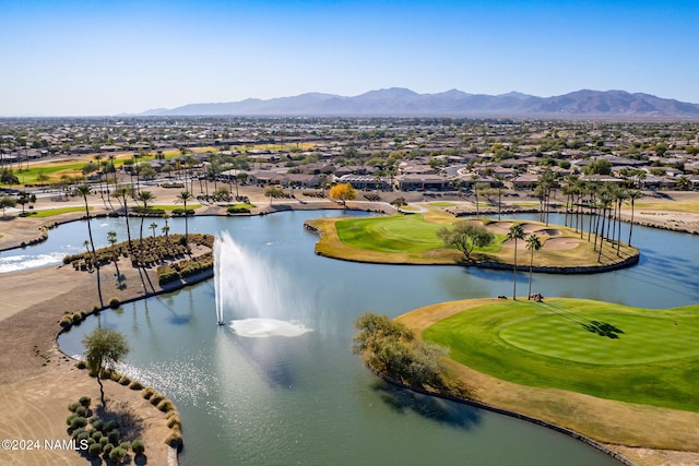 bird's eye view with a water and mountain view