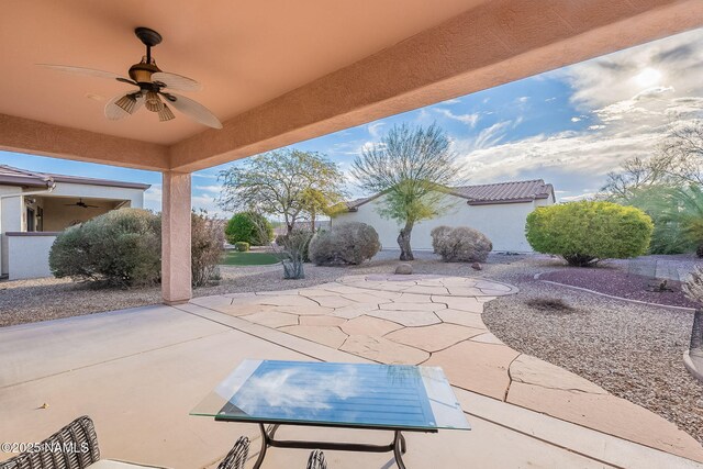 view of patio with ceiling fan