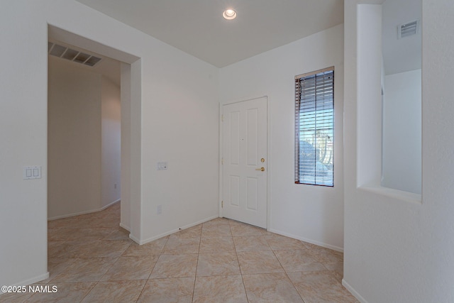 view of tiled spare room