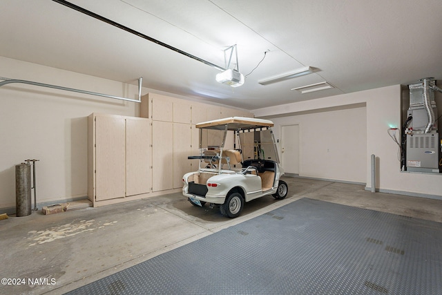 garage with heating unit and a garage door opener