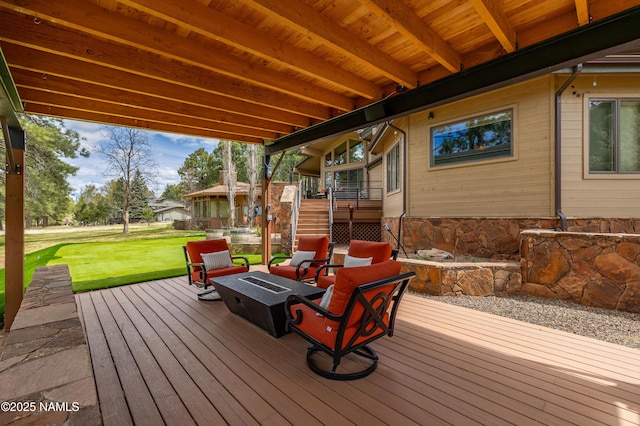 1451 N Mariposa Rd, Flagstaff, AZ 86004 - wooden deck featuring an outdoor fire pit and a lawn