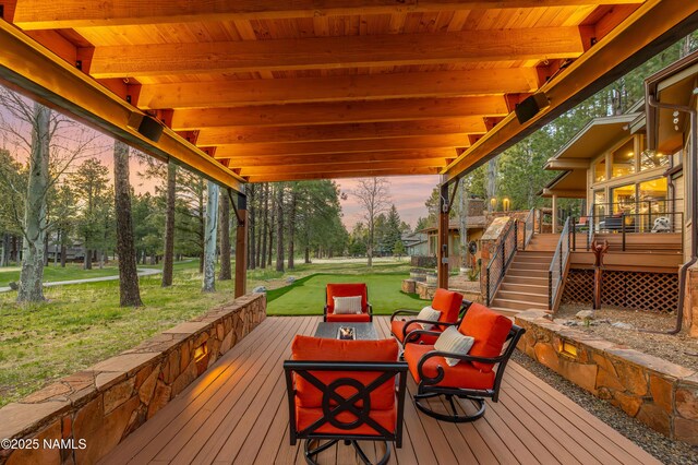 1451 N Mariposa Rd, Flagstaff, AZ 86004 - deck featuring stairs, a lawn, and an outdoor living space