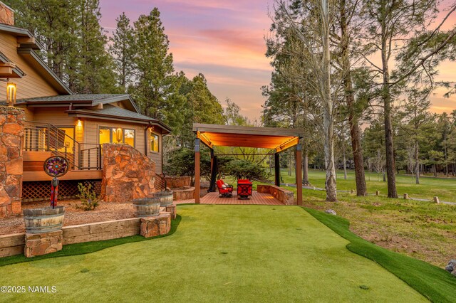 1451 N Mariposa Rd, Flagstaff, AZ 86004 - yard at dusk featuring a wooden deck and a yard