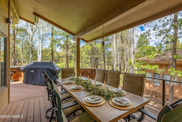 1451 N Mariposa Rd, Flagstaff, AZ 86004 - wooden terrace featuring outdoor dining space and view of scattered trees