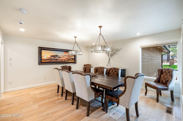 1451 N Mariposa Rd, Flagstaff, AZ 86004 - dining room featuring light wood-type flooring, recessed lighting, baseboards, and a chandelier