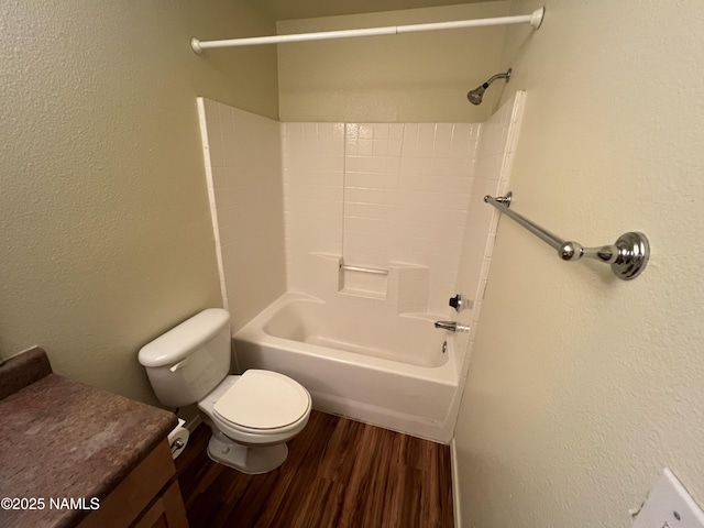 1185 W University Dr Unit 15-222, Flagstaff, AZ 86001 - full bath with wood finished floors, tub / shower combination, vanity, and a textured wall