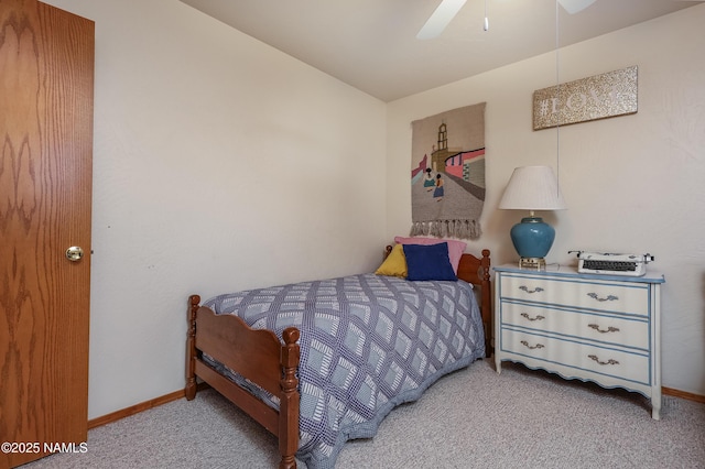 bedroom with baseboards, carpet flooring, and ceiling fan