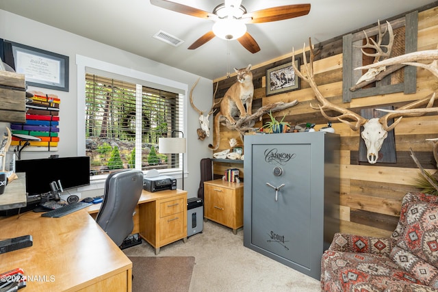 home office with ceiling fan and light colored carpet