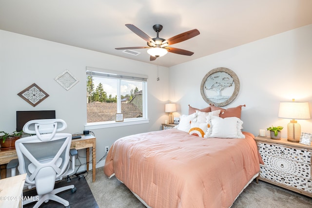 carpeted bedroom with ceiling fan