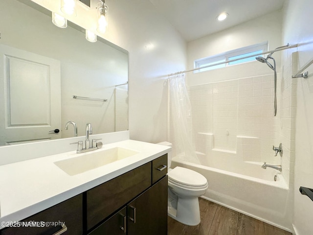 bathroom featuring recessed lighting, shower / bathtub combination with curtain, toilet, vanity, and wood finished floors