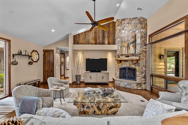 2047 E Del Rae Dr Unit 163, Flagstaff, AZ 86005 - living room with vaulted ceiling, wood finished floors, a ceiling fan, and a fireplace
