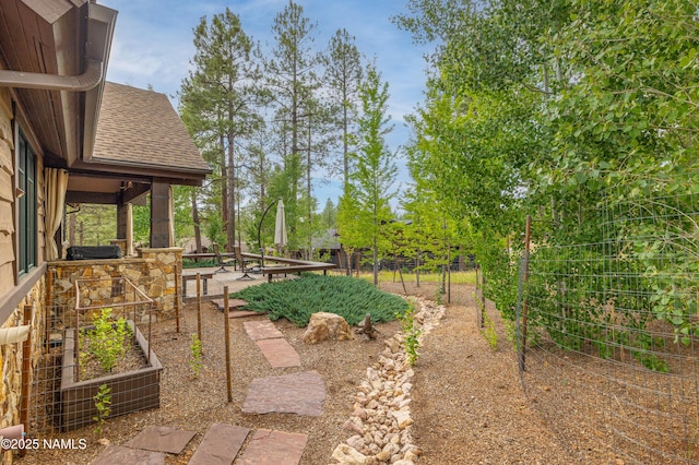 2047 E Del Rae Dr Unit 163, Flagstaff, AZ 86005 - view of yard featuring a garden
