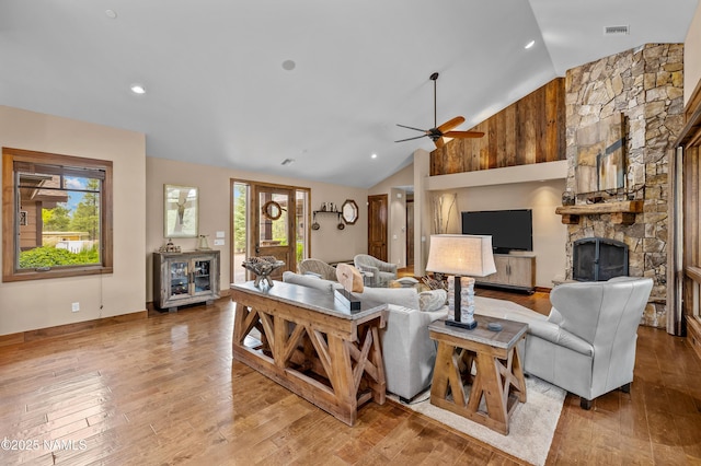 2047 E Del Rae Dr Unit 163, Flagstaff, AZ 86005 - living area with lofted ceiling, hardwood / wood-style floors, a fireplace, ceiling fan, and recessed lighting