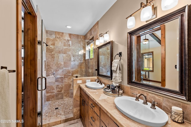 2047 E Del Rae Dr Unit 163, Flagstaff, AZ 86005 - bathroom featuring a shower stall and double vanity