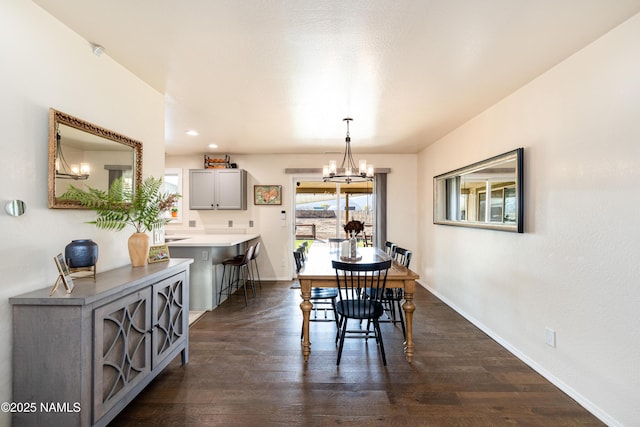 dining area with baseboards, recessed lighting, a chandelier, and dark wood-style floors