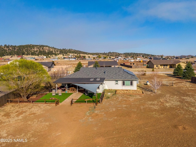 bird's eye view with a mountain view and a residential view