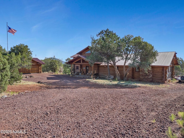 log home with a garage