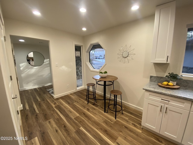 1024 E Hillcrest Dr, Flagstaff, AZ 86004 - dining space featuring dark wood-style flooring, recessed lighting, and baseboards