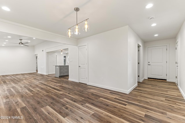 1024 E Hillcrest Dr, Flagstaff, AZ 86004 - unfurnished living room with recessed lighting, dark wood finished floors, baseboards, and ceiling fan