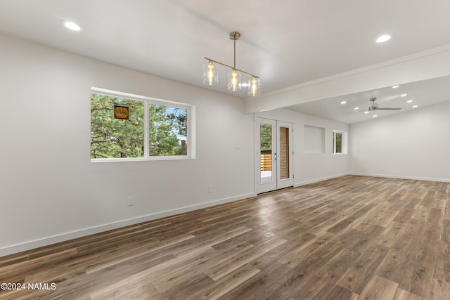 1024 E Hillcrest Dr, Flagstaff, AZ 86004 - spare room featuring recessed lighting, wood finished floors, baseboards, and a ceiling fan