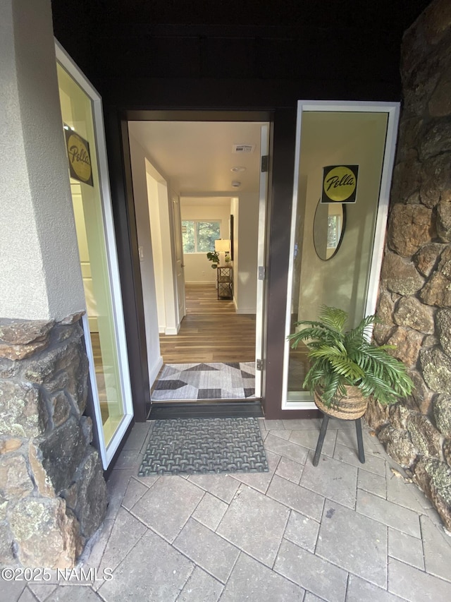 1024 E Hillcrest Dr, Flagstaff, AZ 86004 - property entrance with stone siding